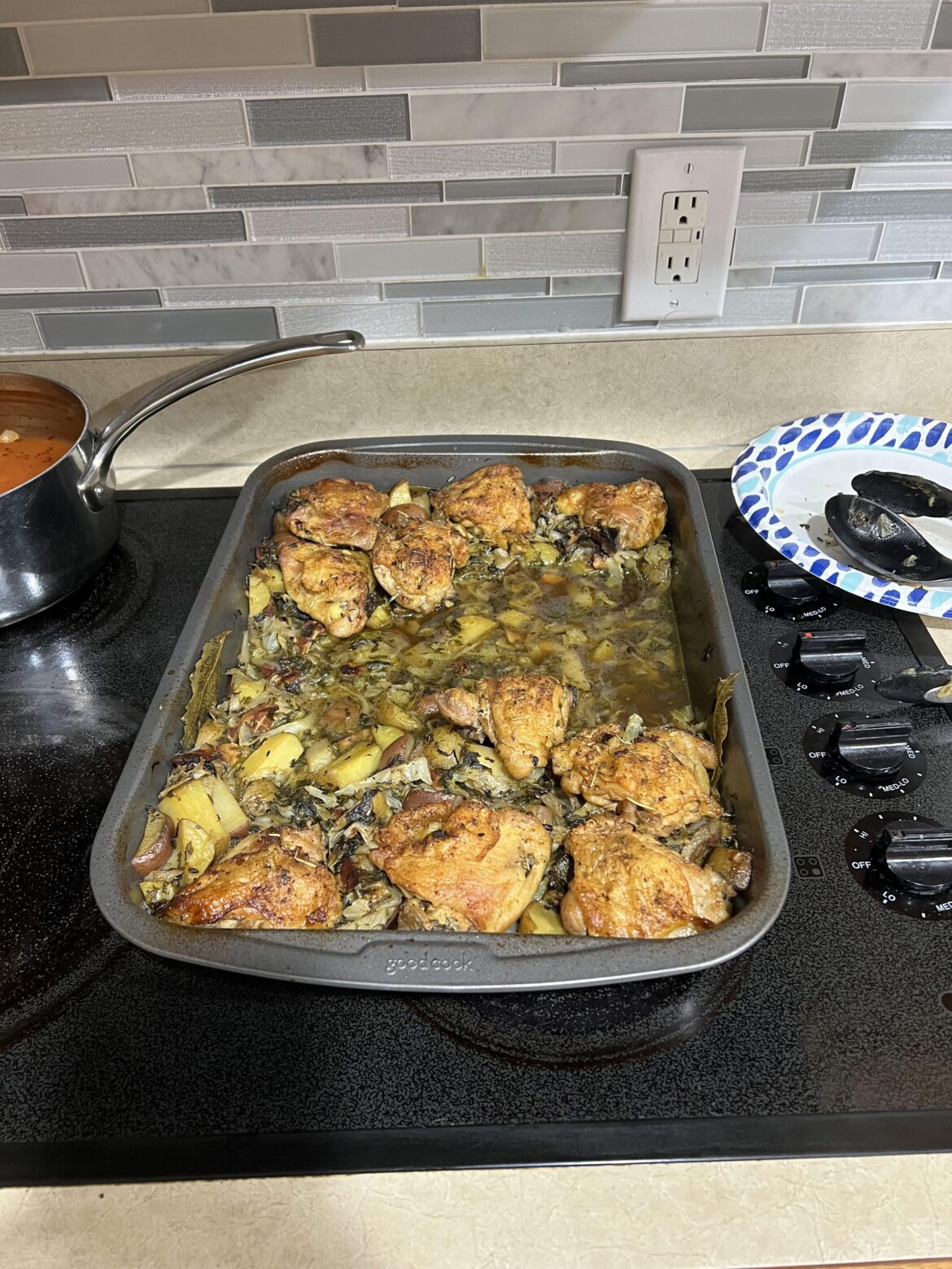 Braised chicken thighs with cabbage and potatoes.