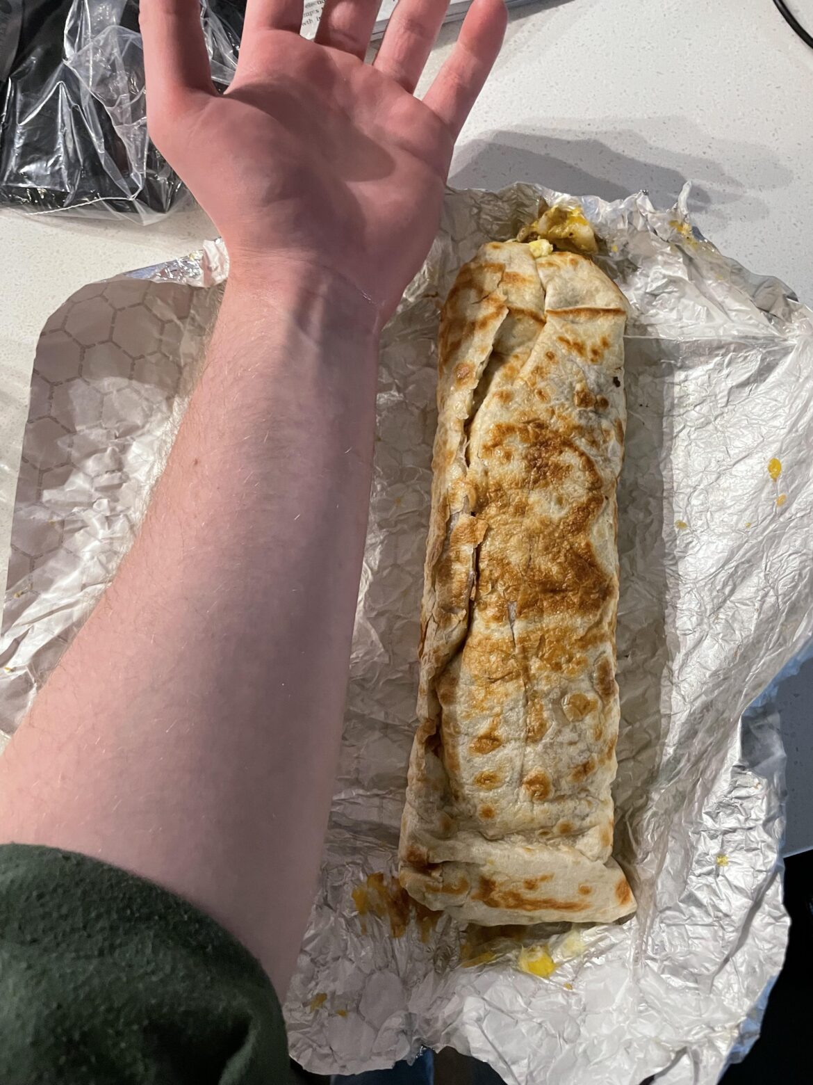 Breakfast Burrito from Con Madre, with my forearm for scale 😂