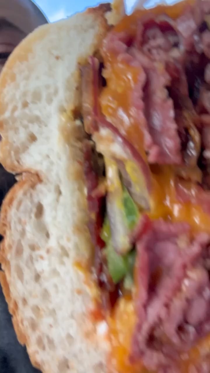 Pastrami and cheddar sandwich. Dining and Cooking