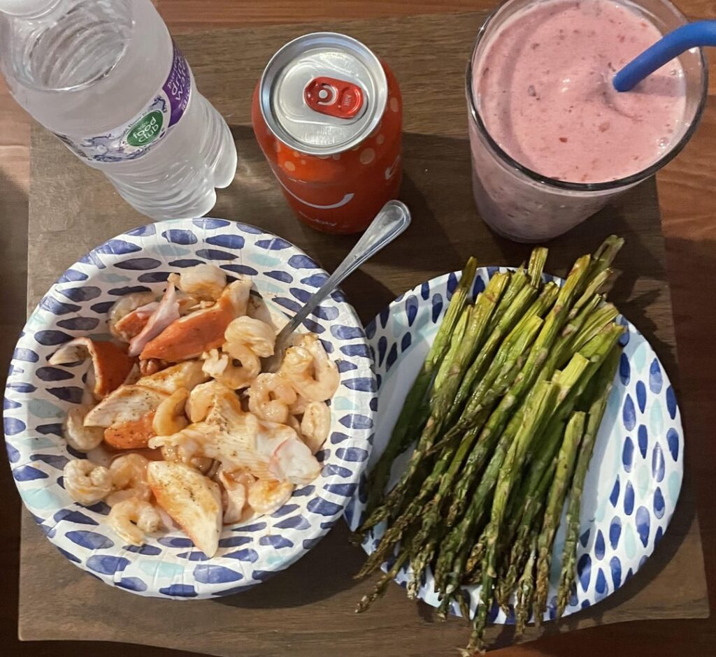 Shrimp, imitation crab, asparagus, water, and a smoothie