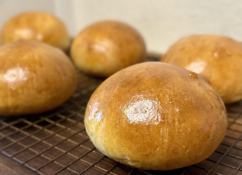 Honey Butter Hamburger Buns, complete with the finished product!