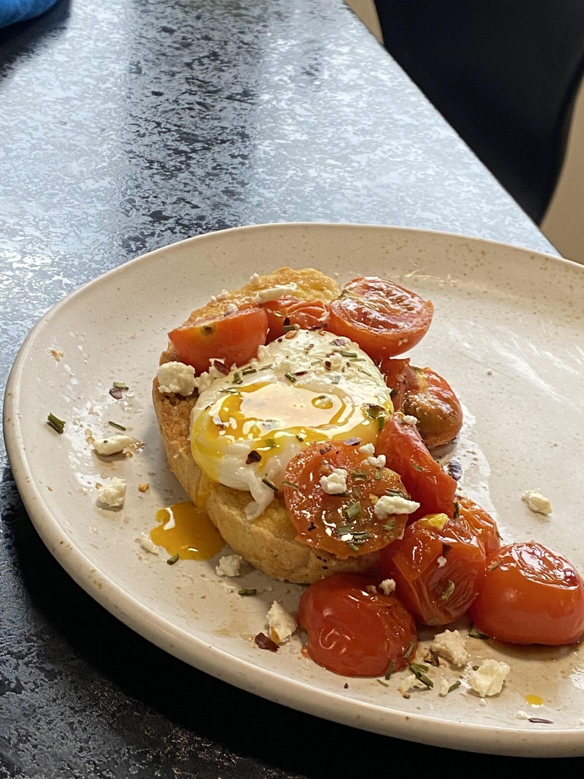 poached egg and cherry tomatoes on toast