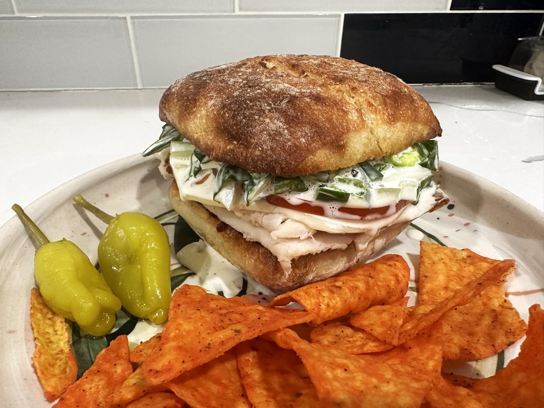 roast chicken breast, chorizo and provolone on a buttered and toasted ...