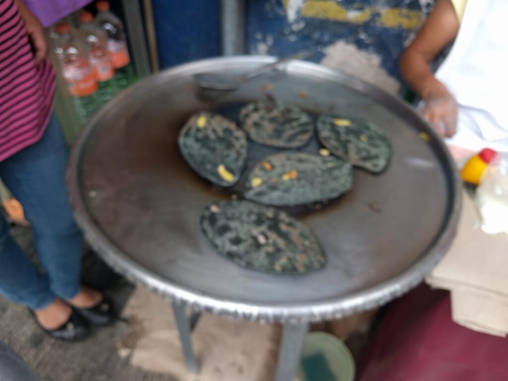 Blue corn tortillas in Mexico City. This lady has run this stand for over 30 years.