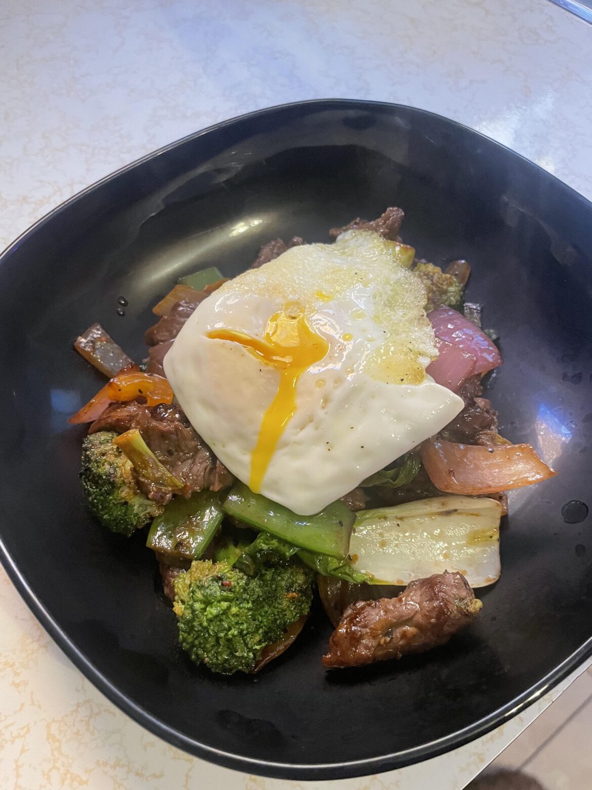 Bison stir fry with a dippy egg