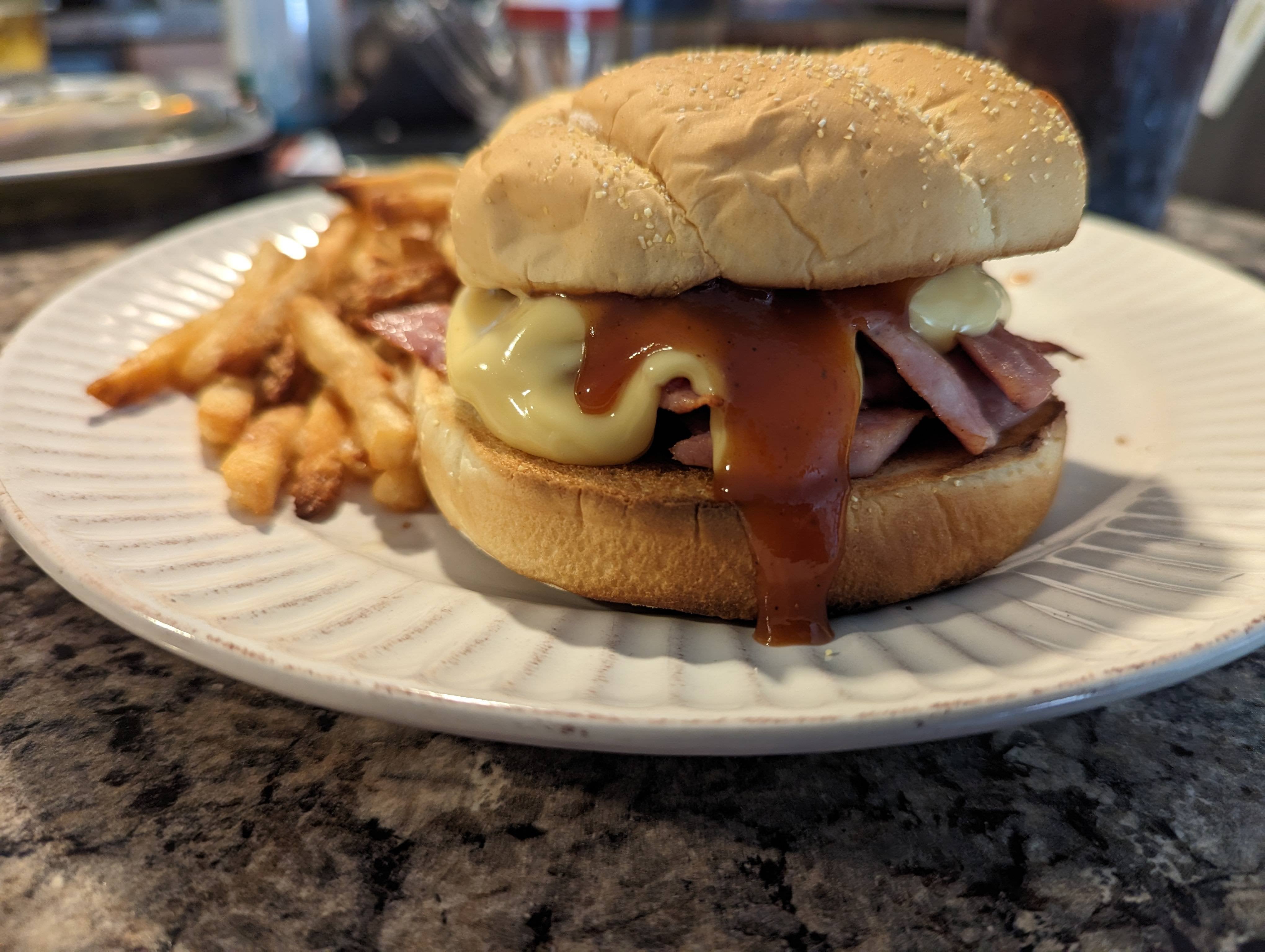 Honey ham and liquid cheddar on a kaiser bun with Arby's sauce