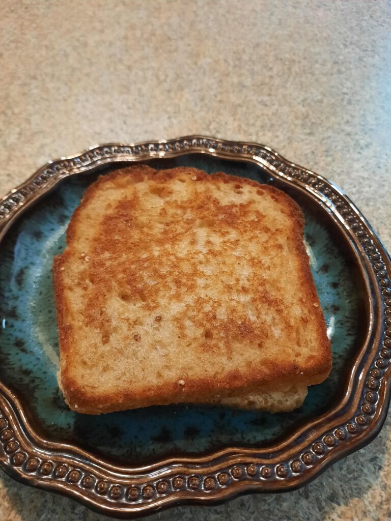 peasant sandwich bread with smoked gouda and shredded queso chihuahua.