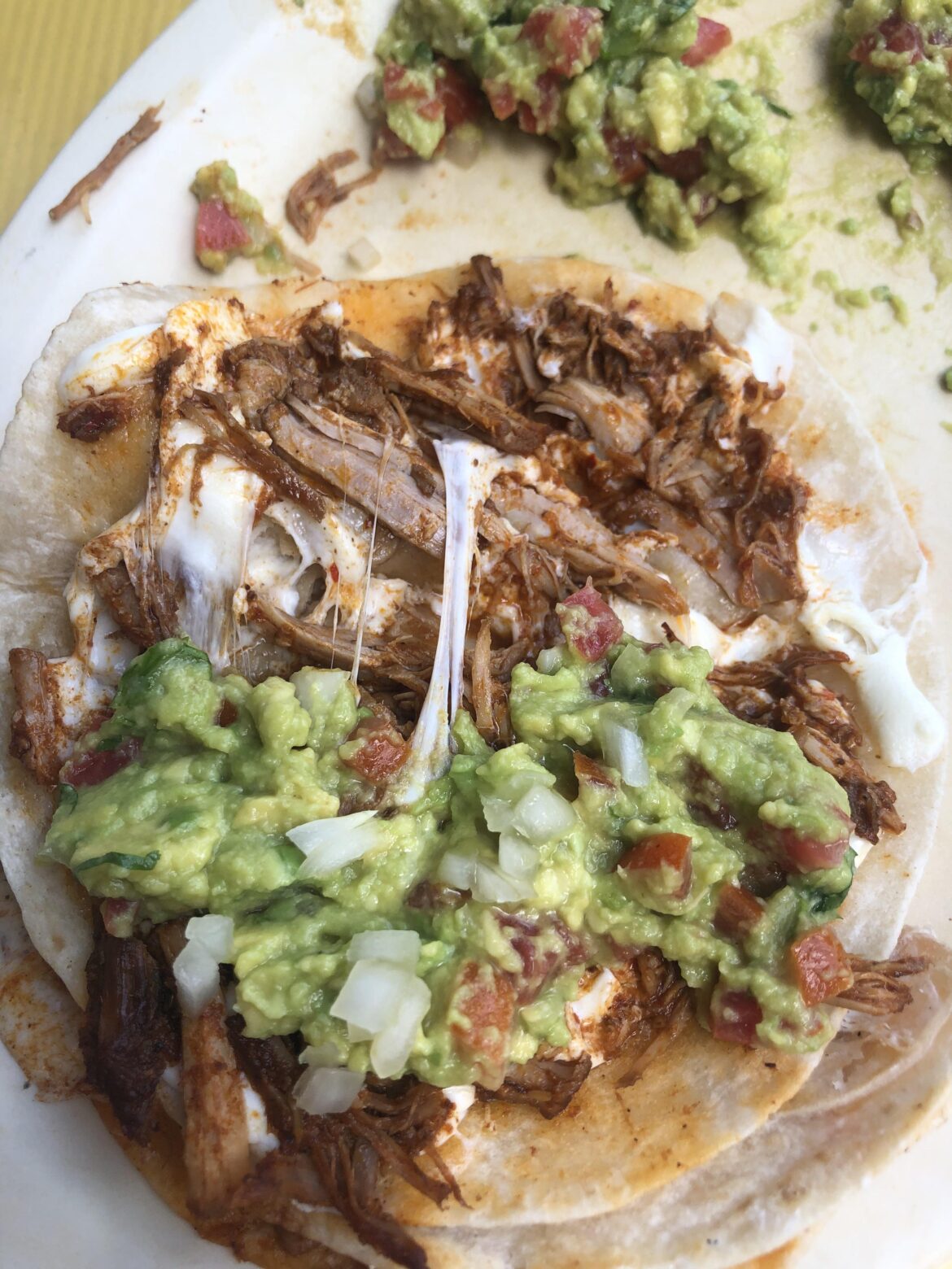 Beef quesadilla with guacamole bought at a Mexican street stall for around $1 🥵