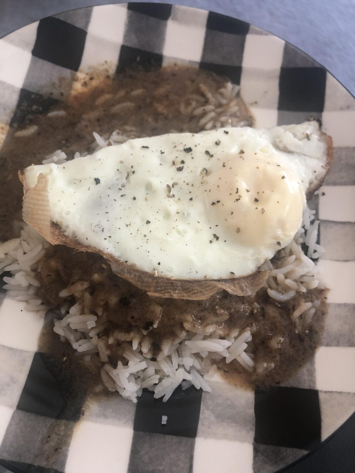 Egg Topper for Rice and Gravy - I can’t handle rare eggs so fella cooked this one extra:-)