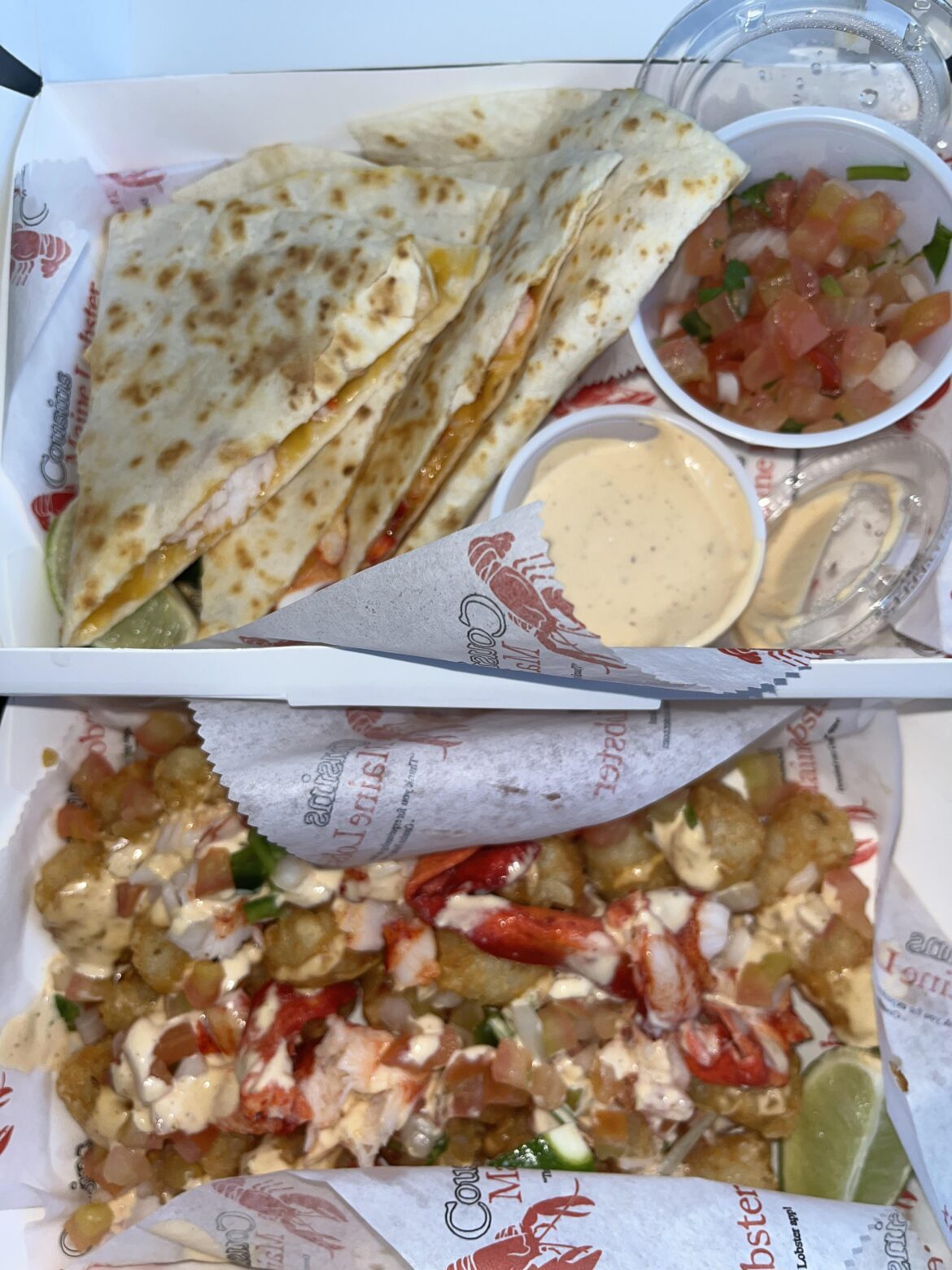 Maine Lobster Food Truck! Lobster quesadillas with pico de gallo and smothered lobster tots.