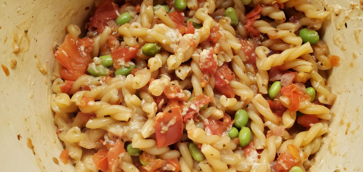 Gemelli with fresh tomato sauce, edamame, and pecorino romano