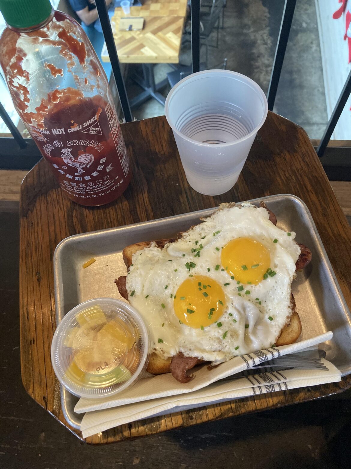 The “It’s Always Sunny”- 2 polish sausage links, brioche and cheese underneath 2 eggs over easy🍳