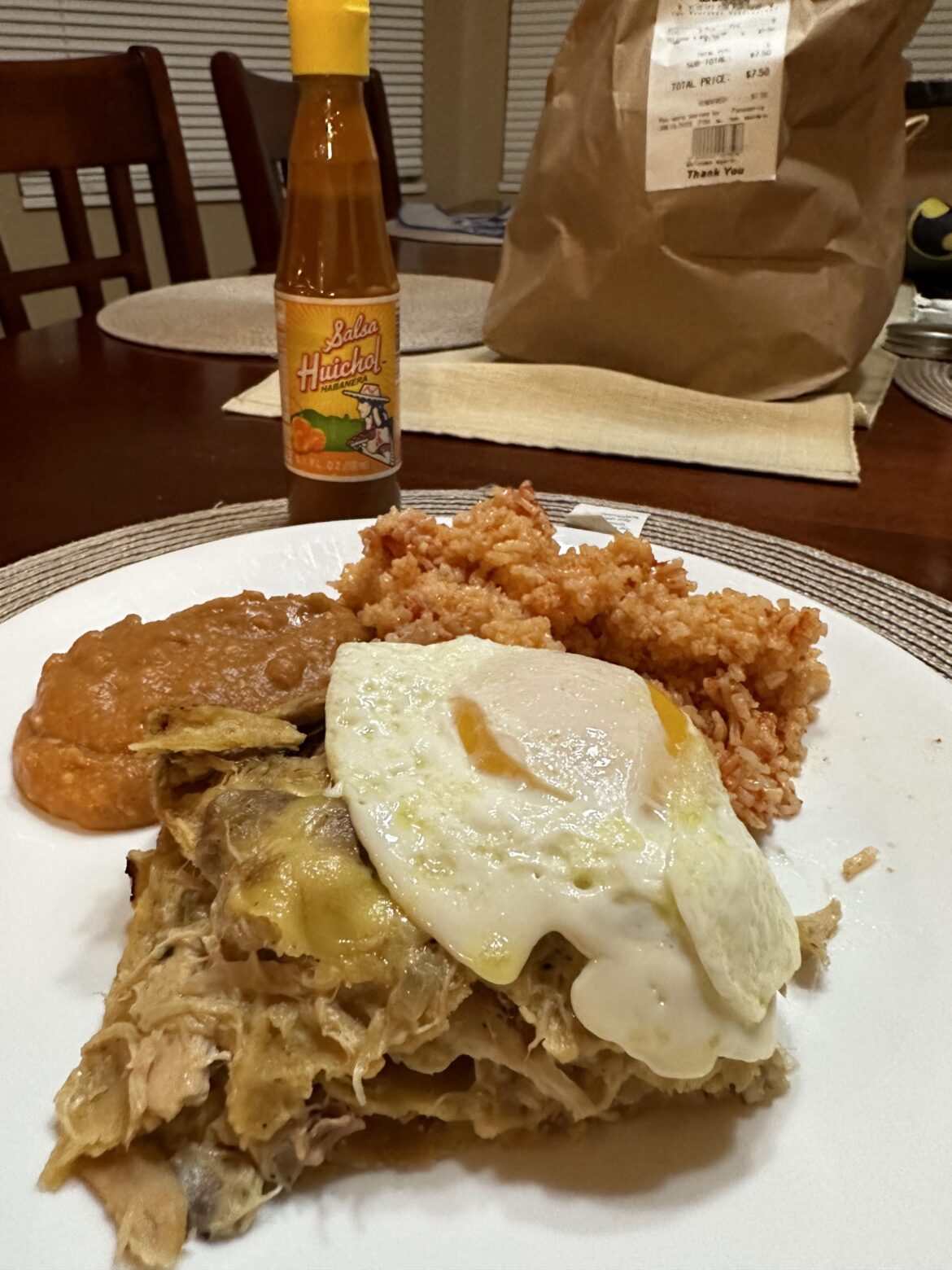 New Mexican style green enchiladas, refried beans and rice.