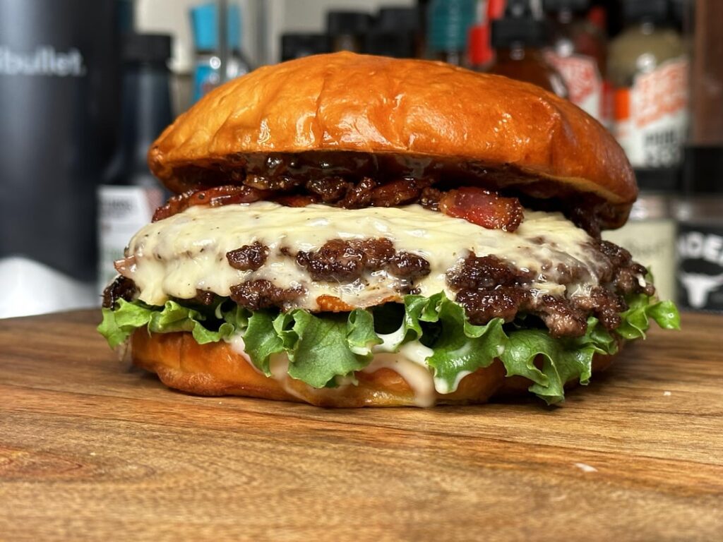 Burger night! Tonight’s special had two home ground smash patties, homemade cheddar Gruyère melting cheese, homemade onion jam, chopped candied bacon, homemade Maple mustard aioli, on a buttered and grilled homemade milk bread bun.