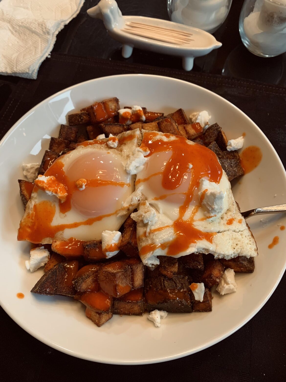 Crispy fried potatoes with garlic & onion powder, smoked paprika, goat cheese, cholula, and the star of the show followed by football..happy Sunday