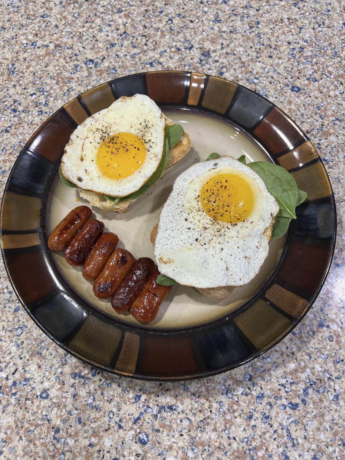 I did a thing… put and egg on it, that is. Ciabatta, sharp cheddar, baby spinach, egg with lil’smokies on the side