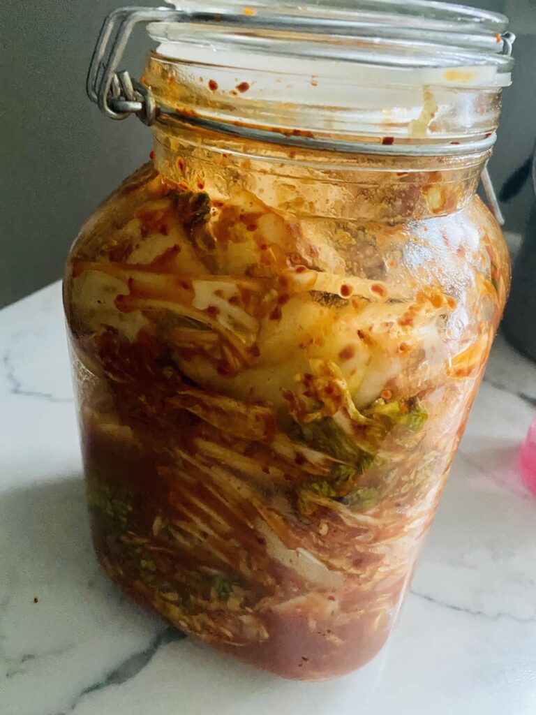 My kimchi process. I’m super excited! Added authenticity with the reused pickle jar, just like my mom lol. First photo is day one, the second 2 are about 3wks in.