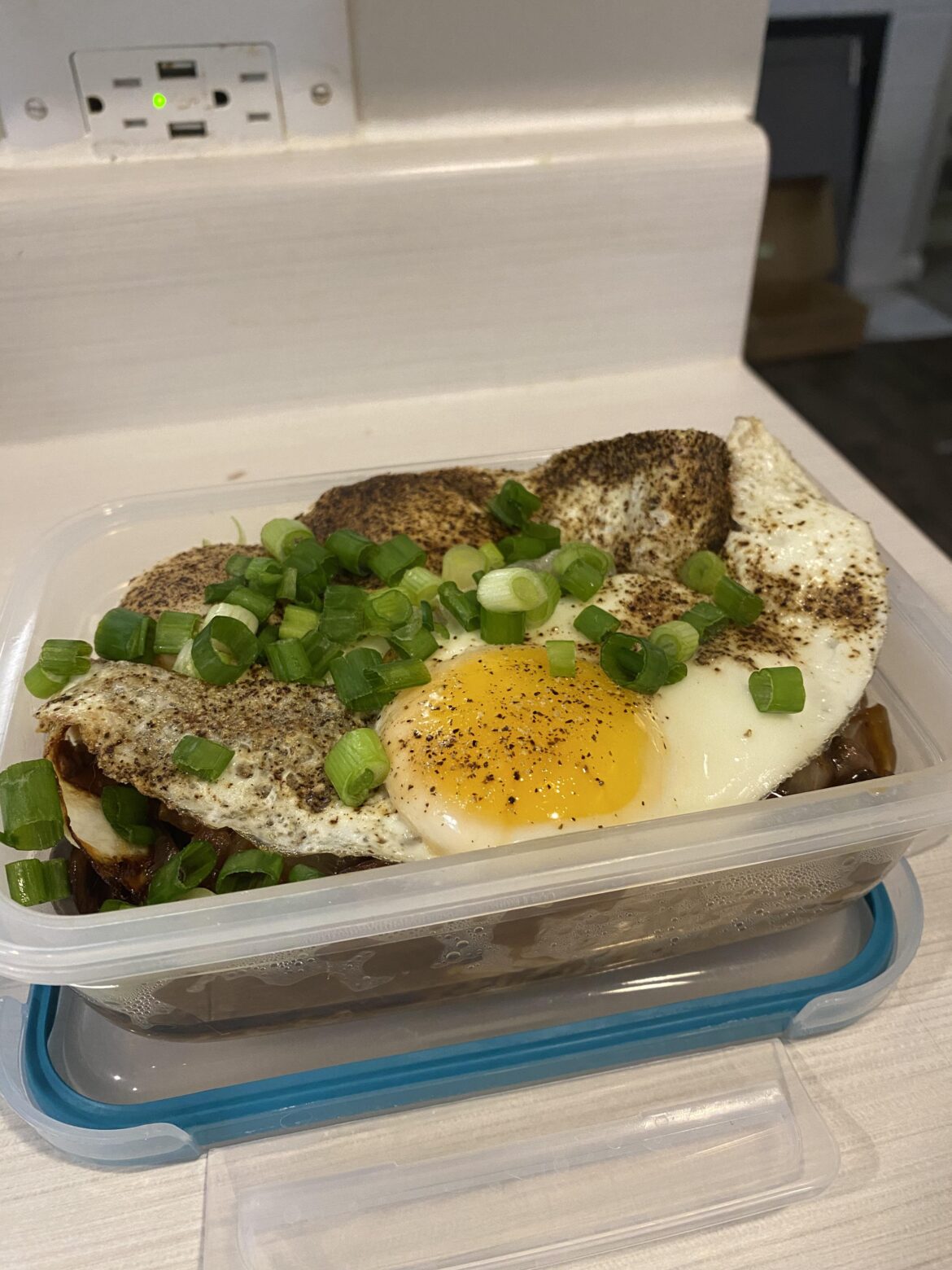 Greasy rice, chuck roast, mushroom & onion gravy, romano cheese, & green onion