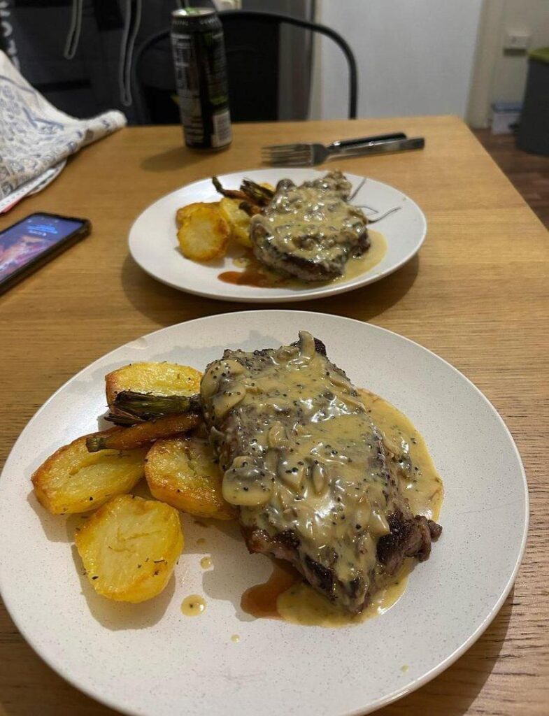 Angus porterhouse steak with a creamy mushroom pepper sauce