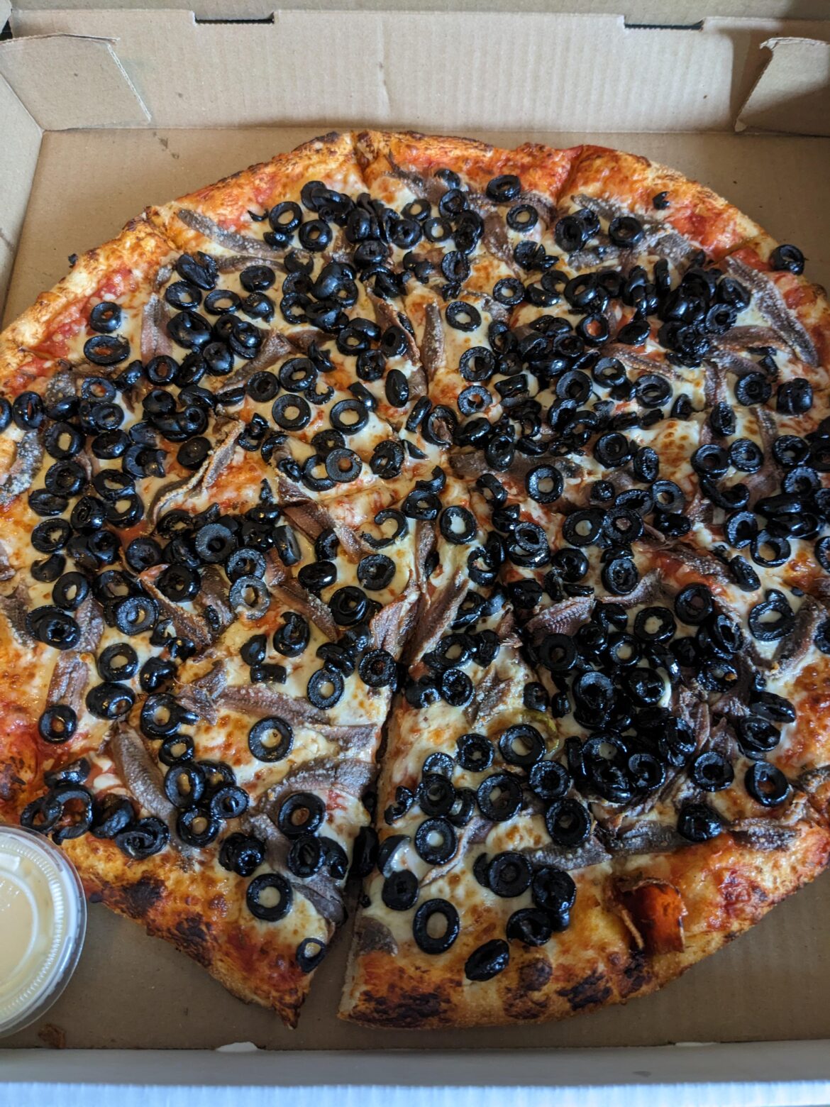 [I ate] Pizza anchovies and black olives