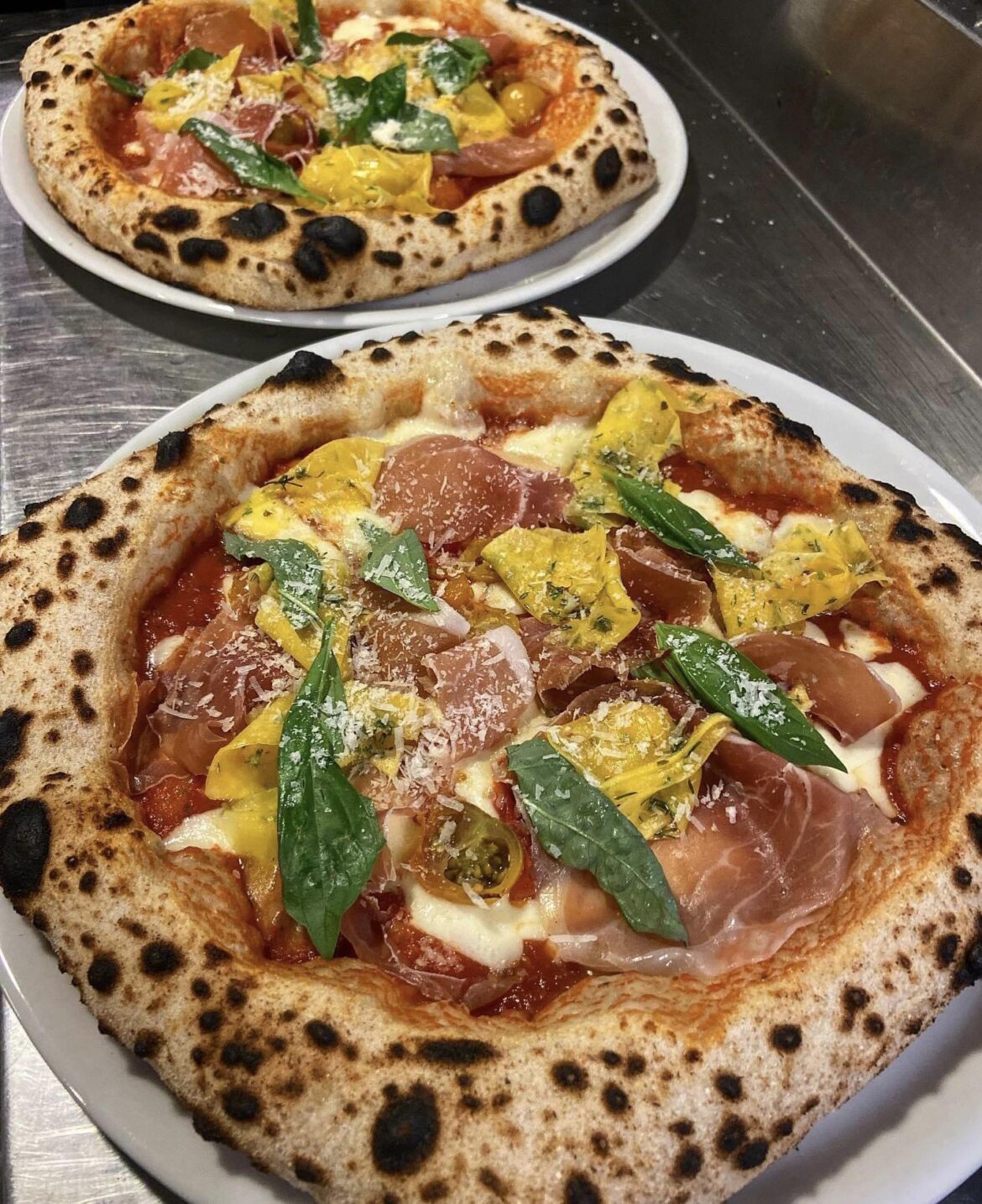 Prosciutto + pickled squash pizzas.