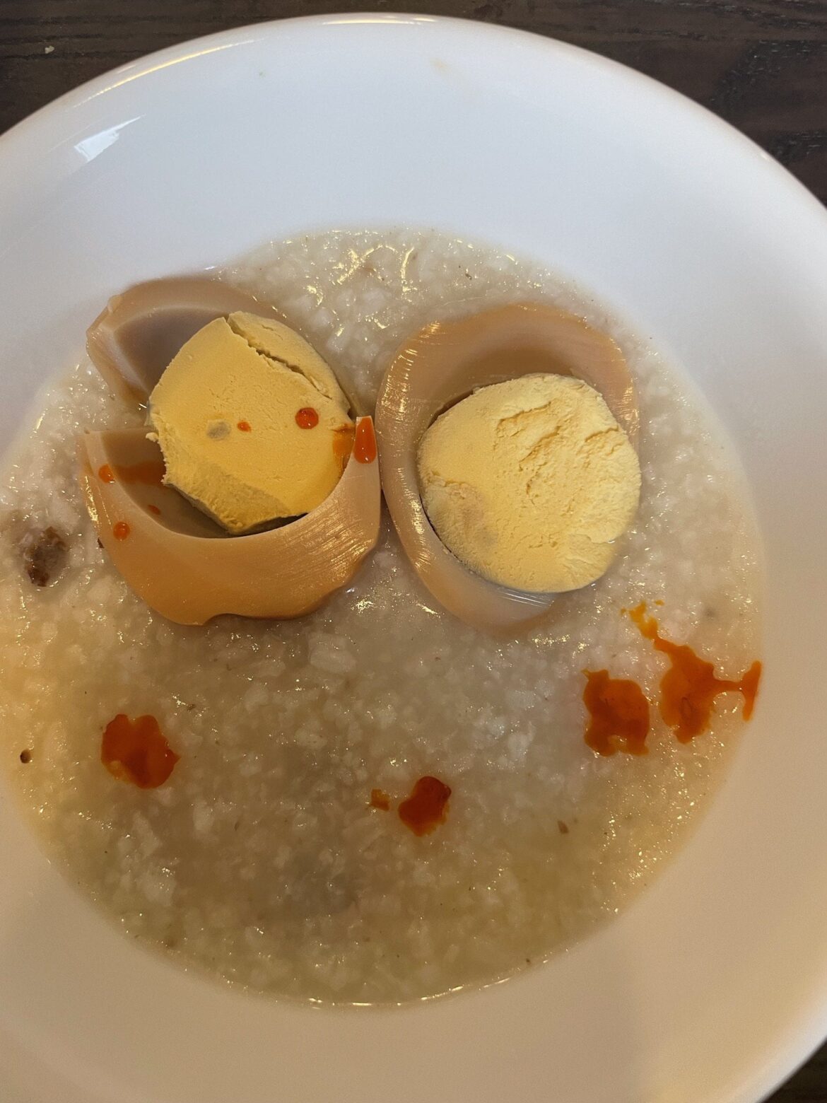 Rice porridge with Korean sauna egg and Szechuan chili oil