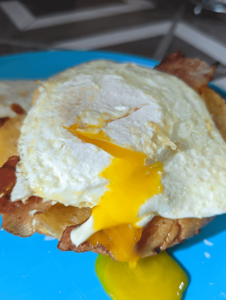 Dippy egg on a asiago bagel with mayo, cheese and bacon.☺️