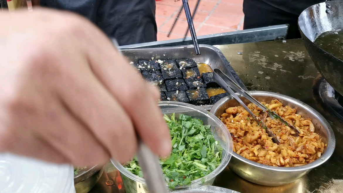 Push the limit by trying Black stink tofu Authentic chinese street food