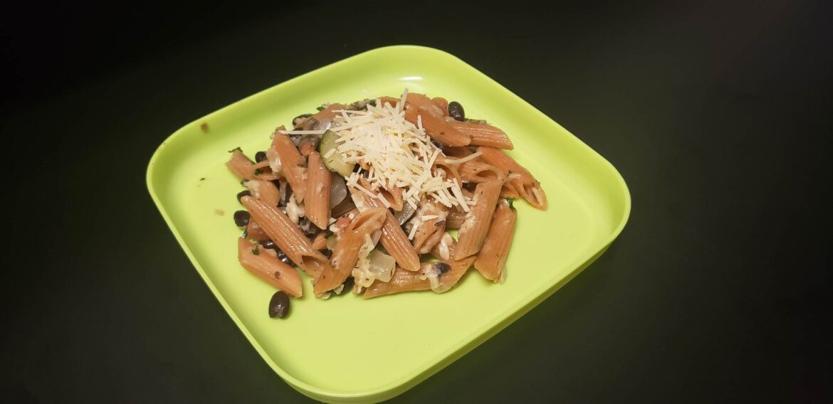 Gluten free red lentil penne with sautéed vegetables and black beans