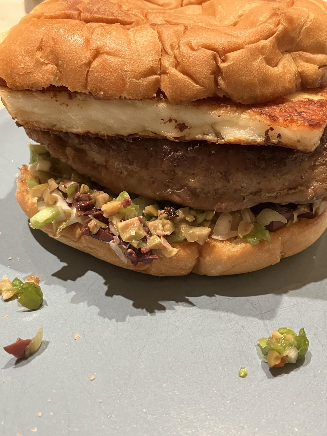 Griddled halloumi, Turkey burg, olive salad Dining and Cooking