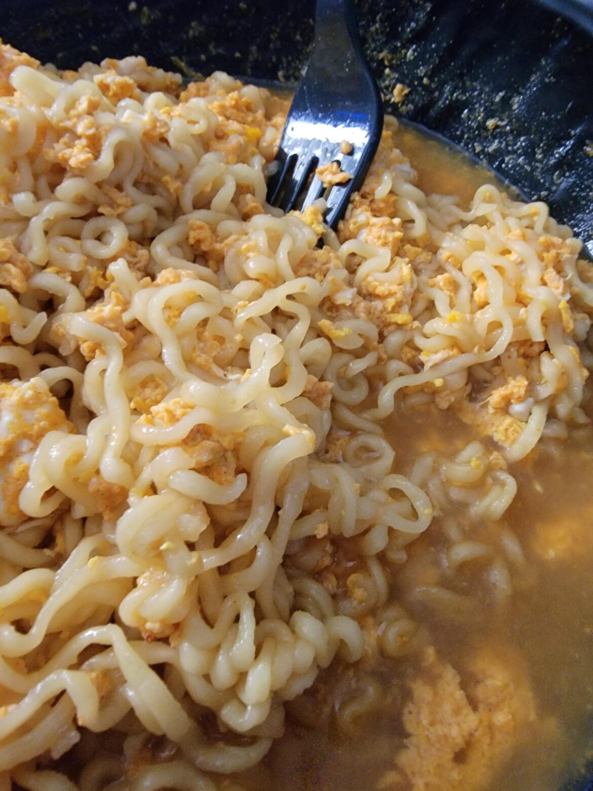 Two shin ramen packets, four eggs.