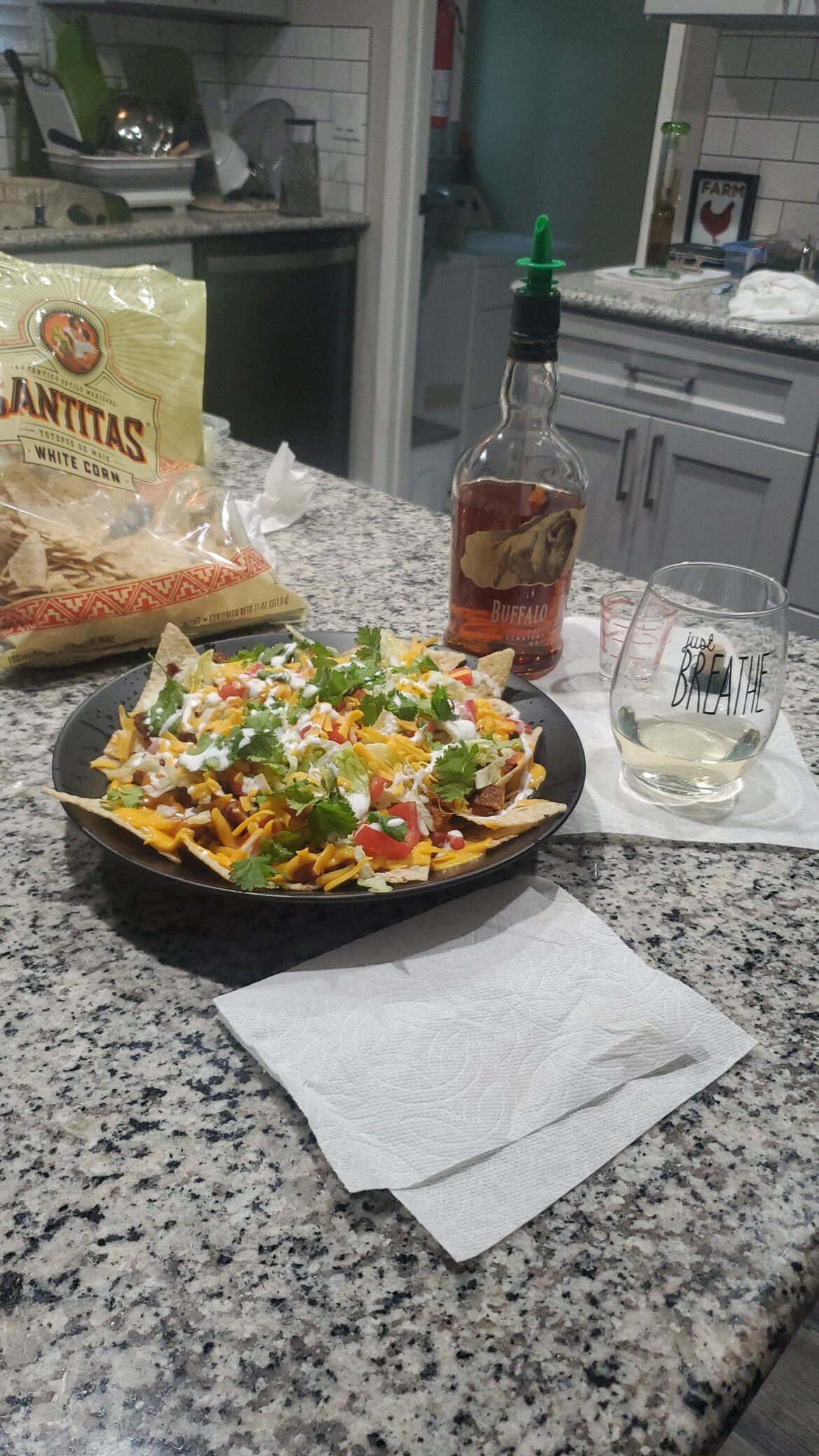 Fancy nachos with fancy drinks.