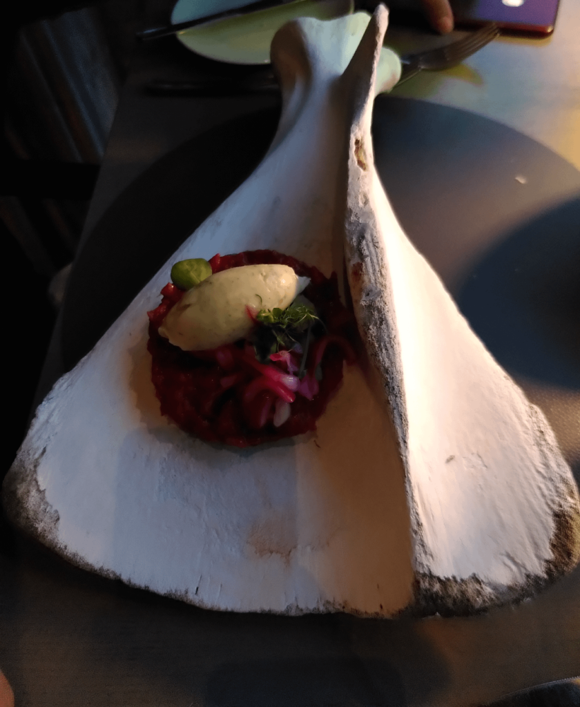 Beef Tartare served on a painted cow bone