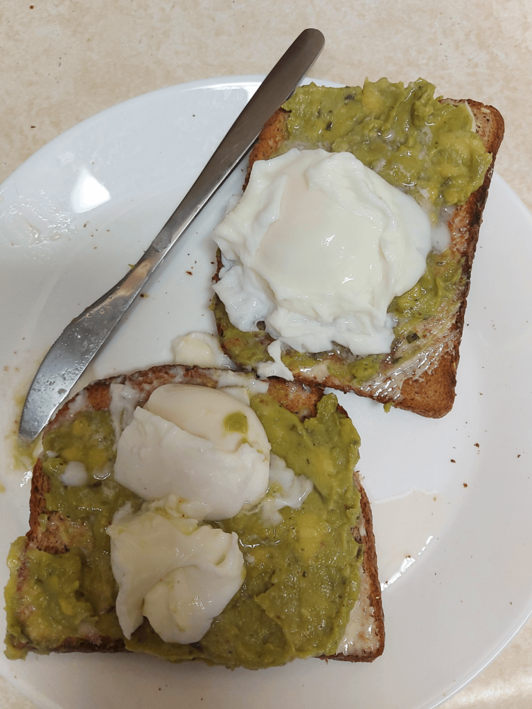 Guac Toast with Poached Eggs on top