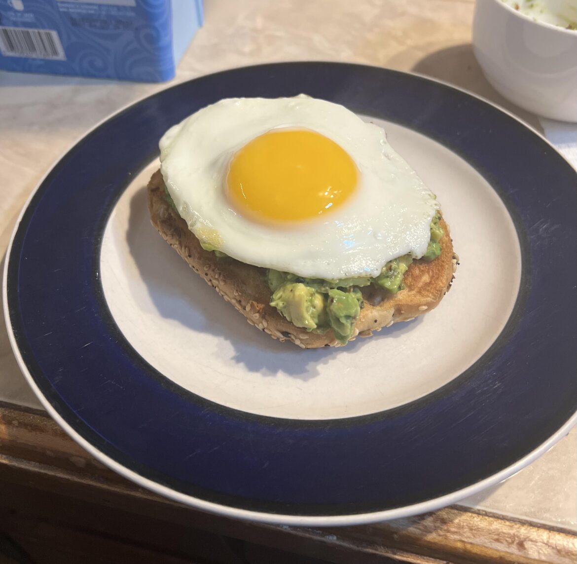 sunny side on avocado on bagel