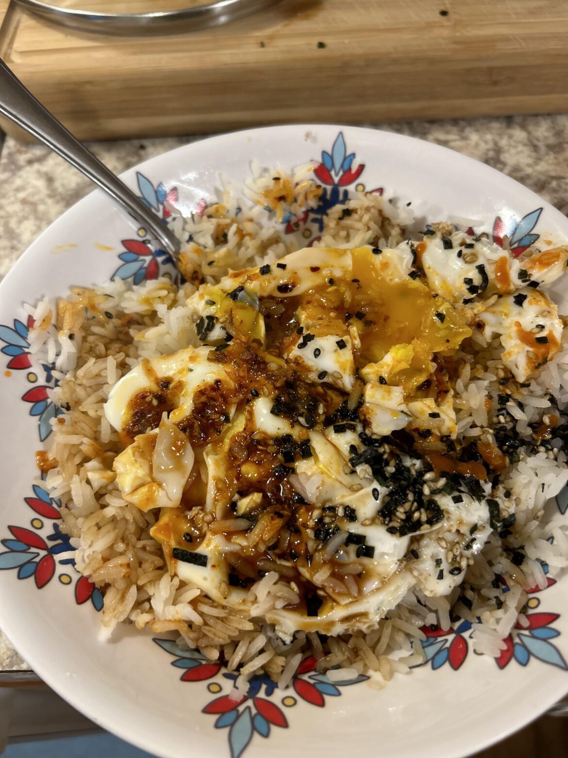 Eggs and a whole lot of chili crisp on left over rice 😋