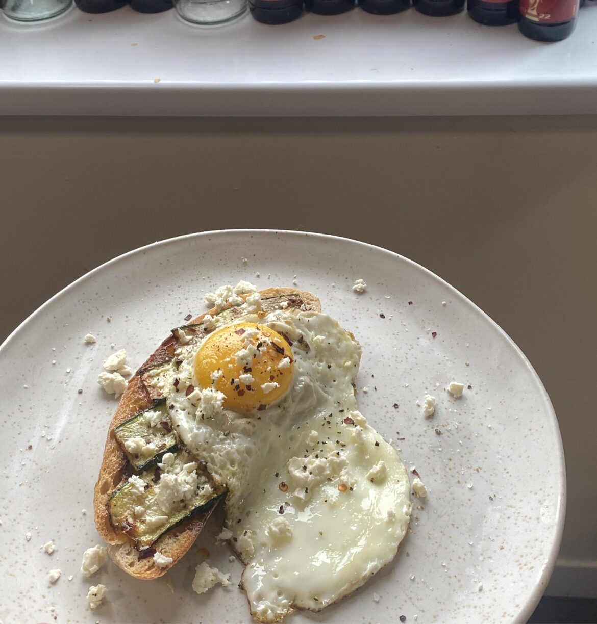 grilled courgette with fried egg on toast