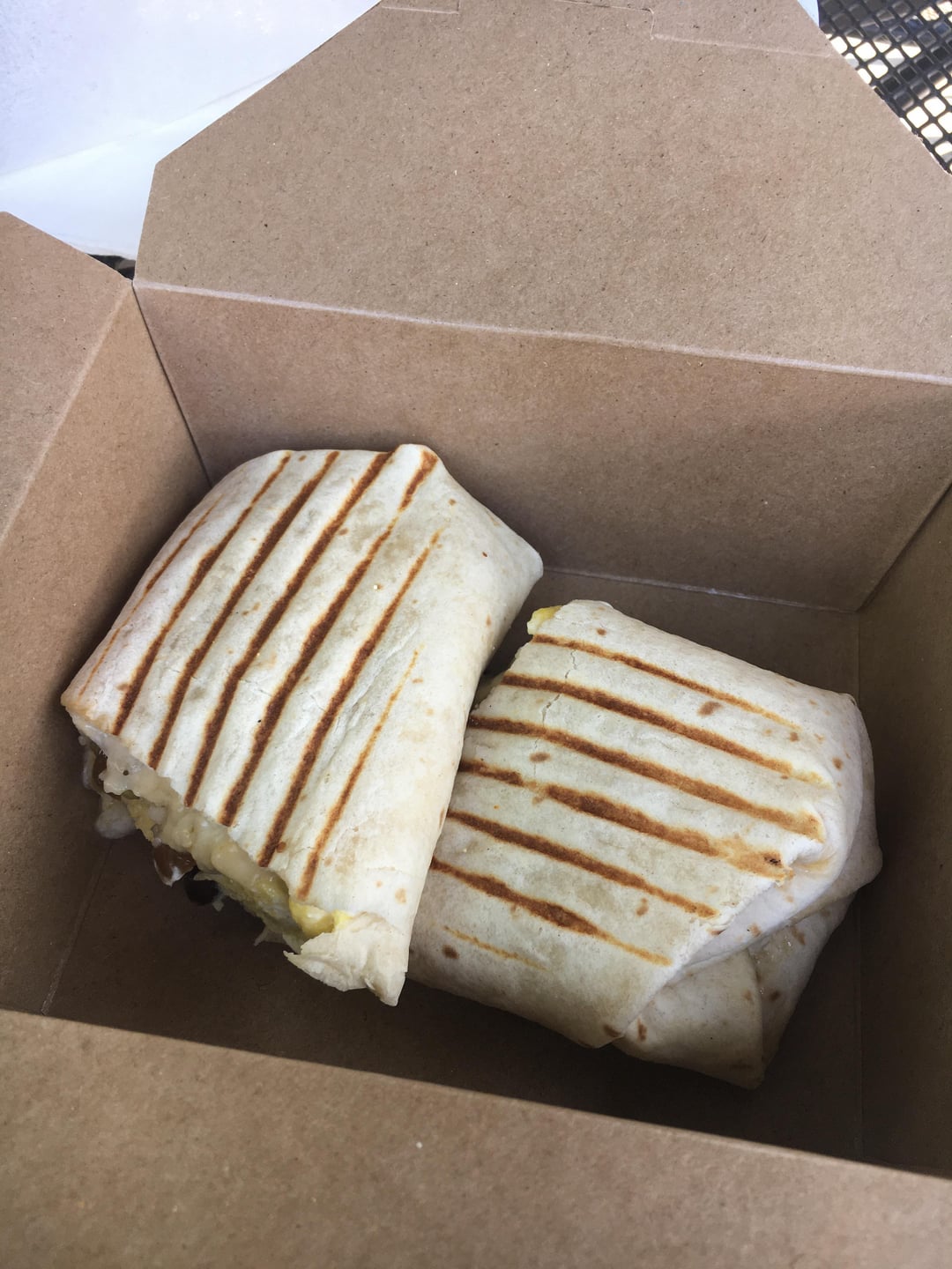 Calories/protein in this breakfast burrito? Has cheese, egg, black