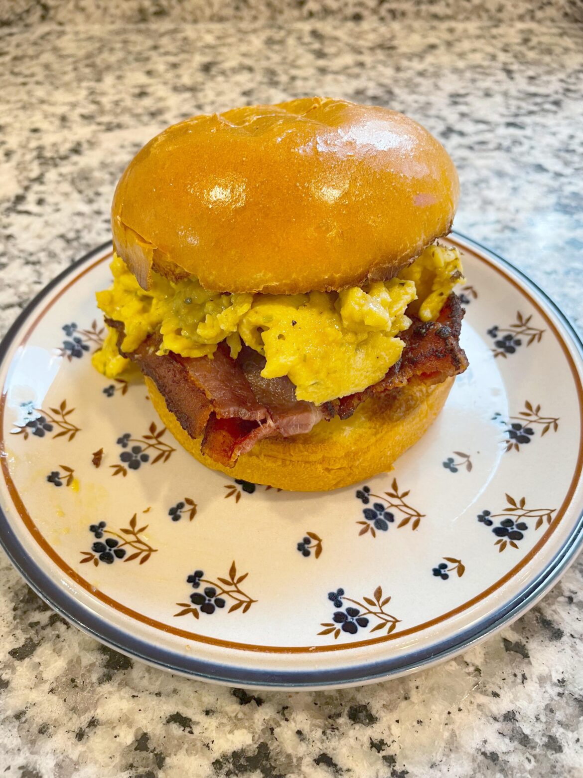 Scrambled on brioche with Gouda and thick cut bacon
