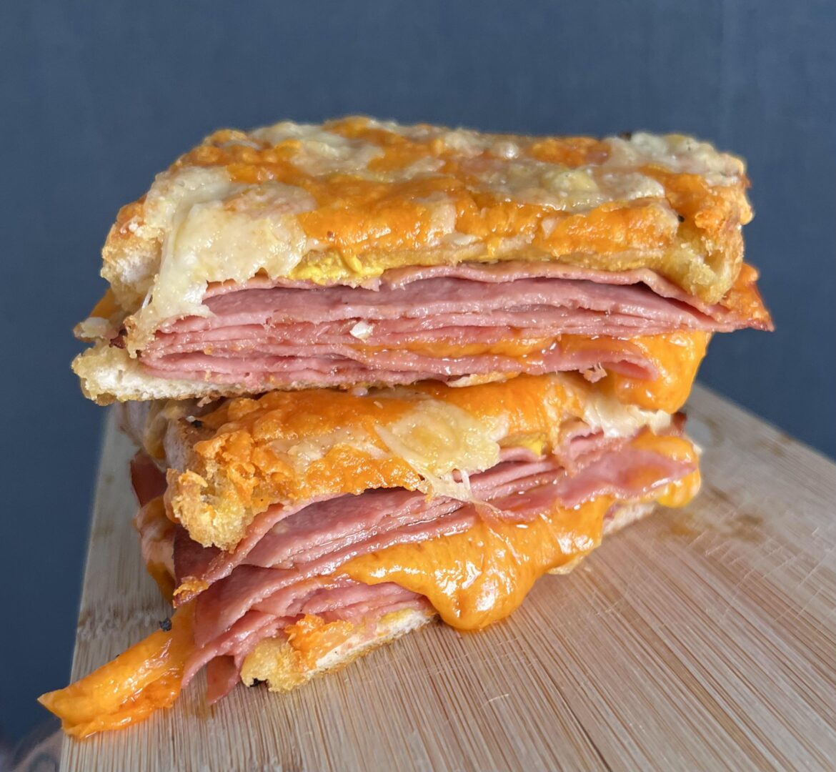 Croque monsieur using smoked ham, cheddar, red leicester and Colman’s mustard.