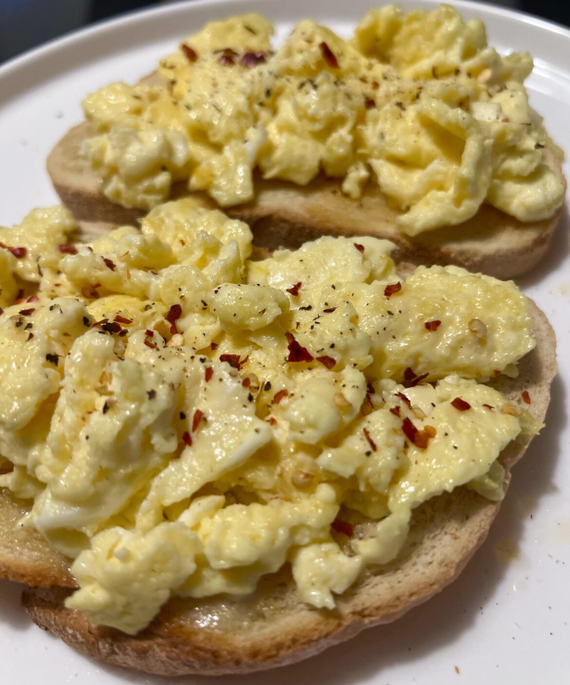 Scrambled, on toasted sourdough with a little chili.