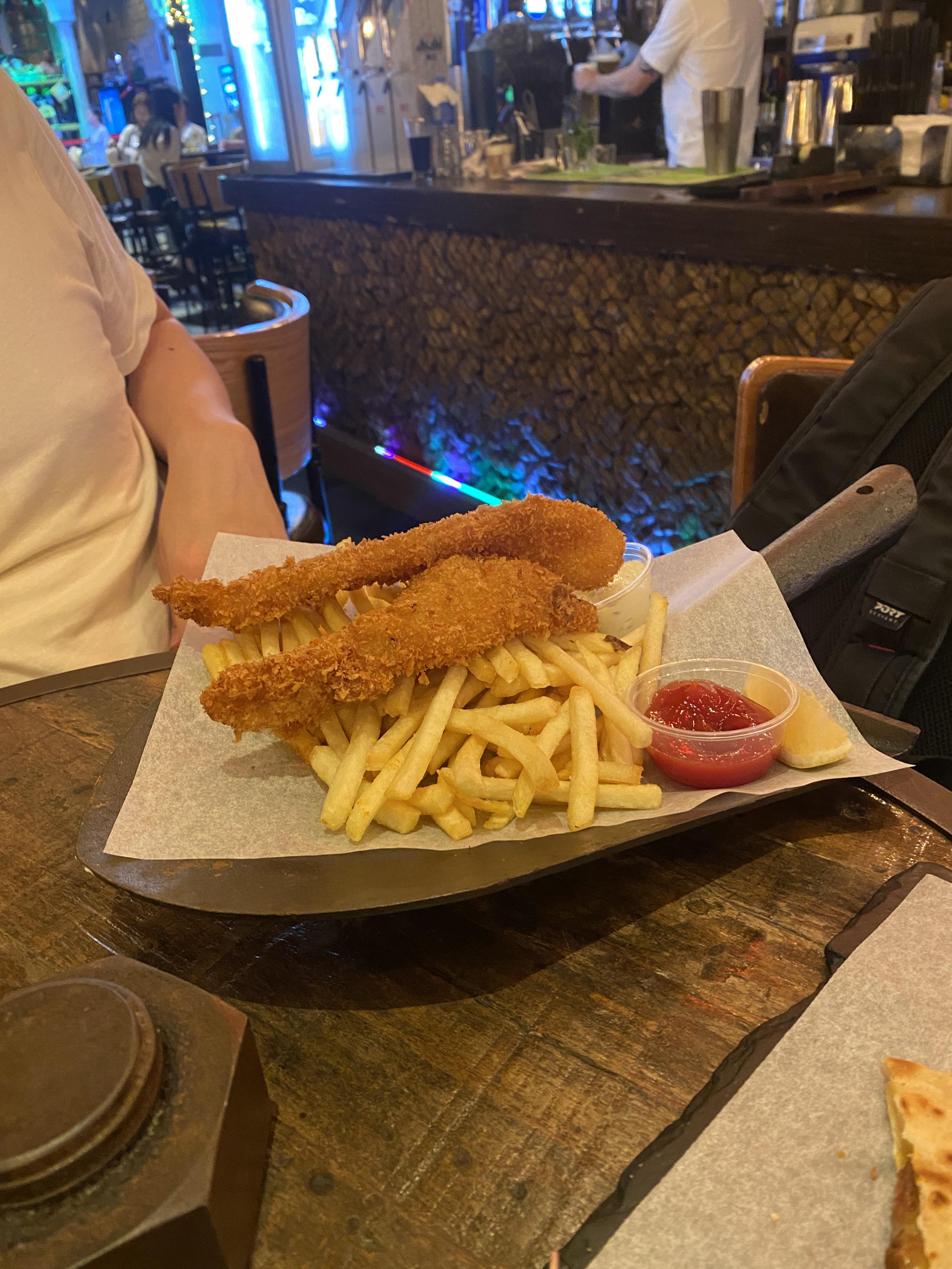 Fish and chips with tomato and tartar reductions, on trowel. Mine, Lan