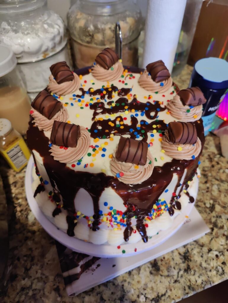 Chocolate devils food with Nutella marshmallow butter cream and hazelnut brittle