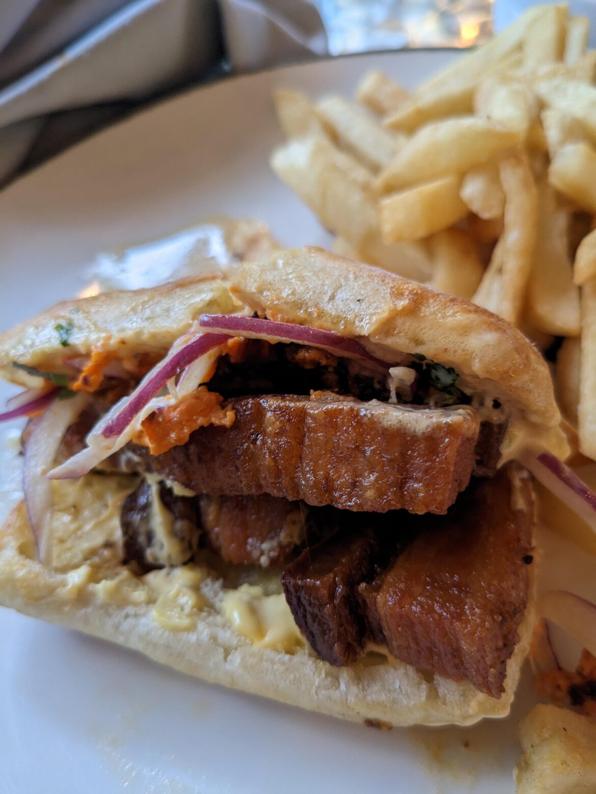 Pork belly chicharon sandwich at Semilla's in Rodger's Park 🤤