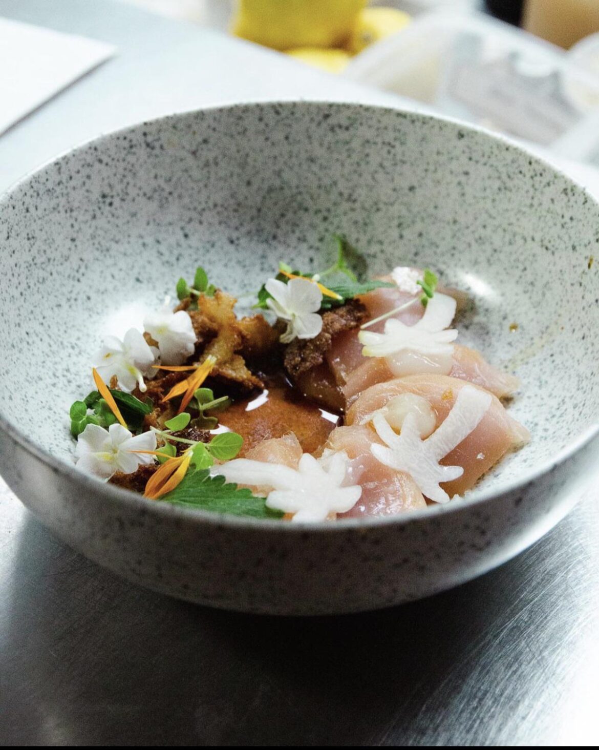 Soju cured tuna, lychee gel, pickled chayote, fried Koji chips, ponzu, lemon basil, Moldavian balm