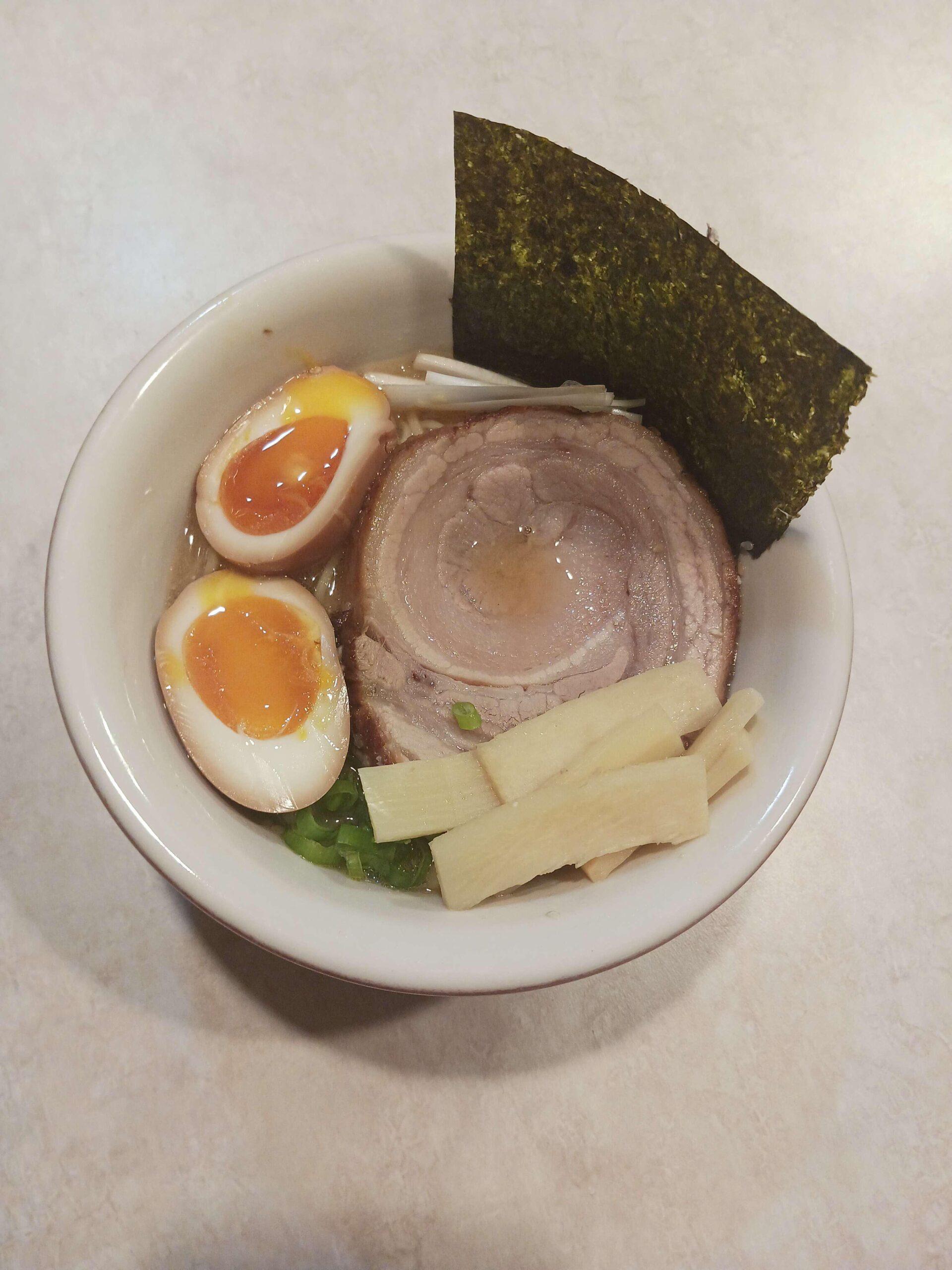 Tiny bowl of Chashu ramen with bamboo shoots Dining and Cooking