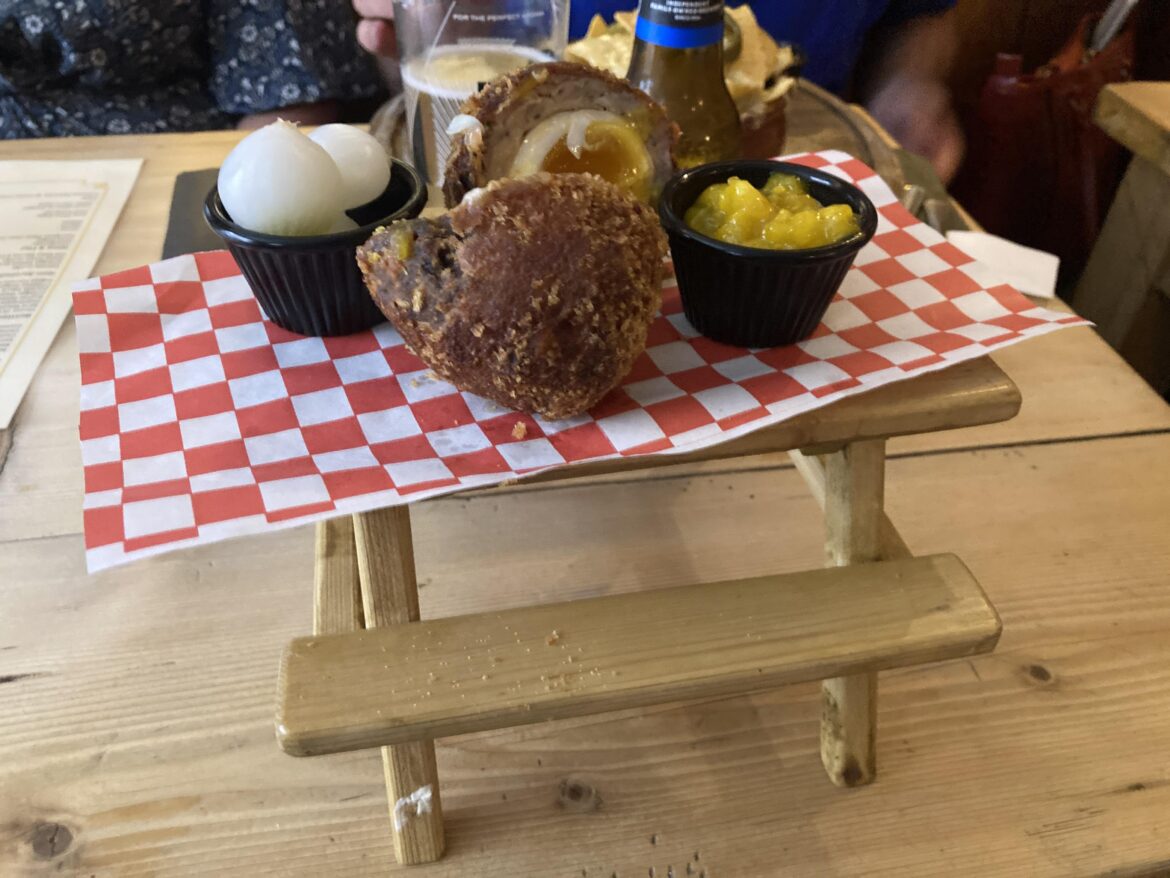 Scotch Egg on miniature picnic table