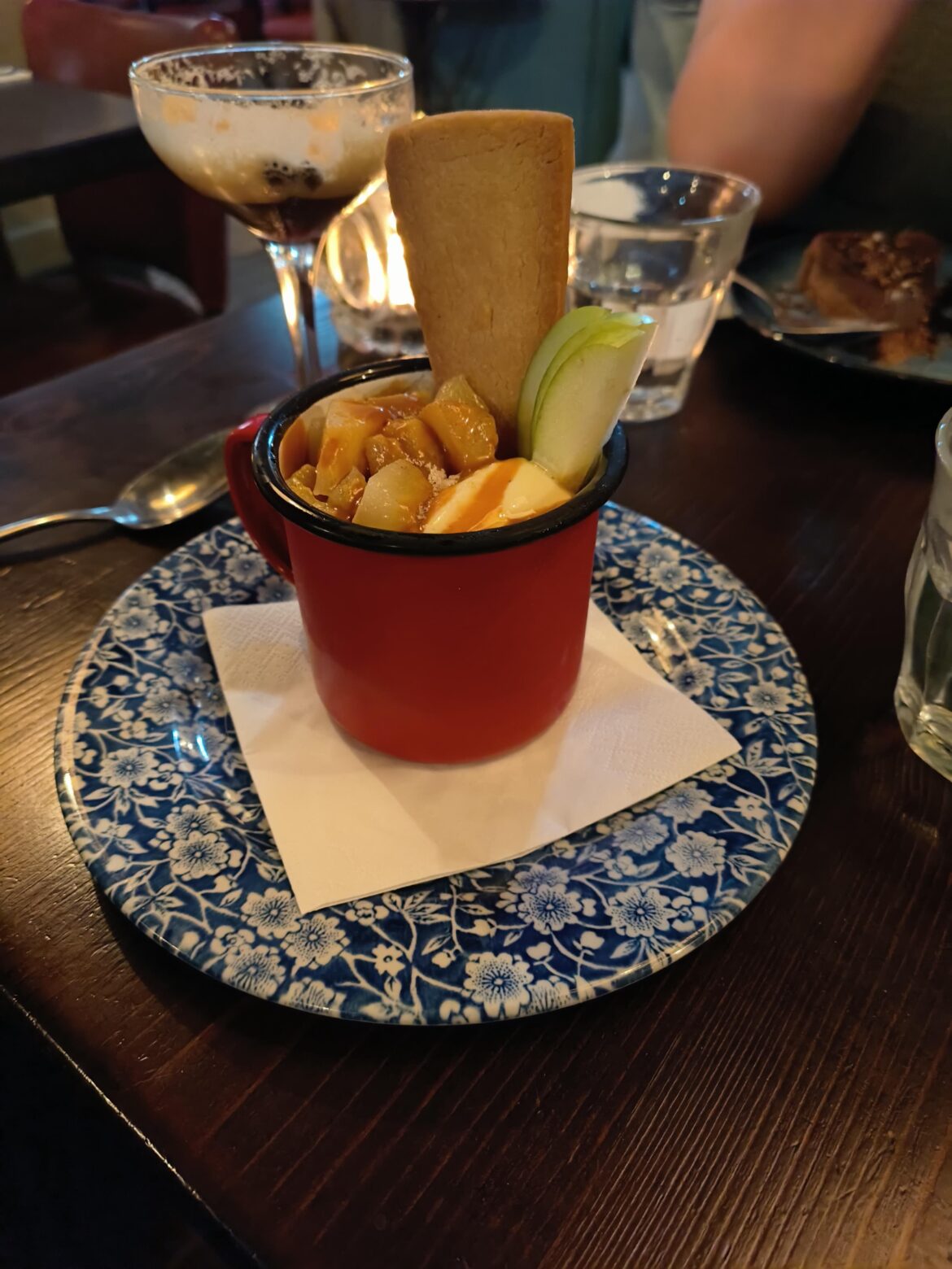 Apple ice cream served in an enamel camping mug!