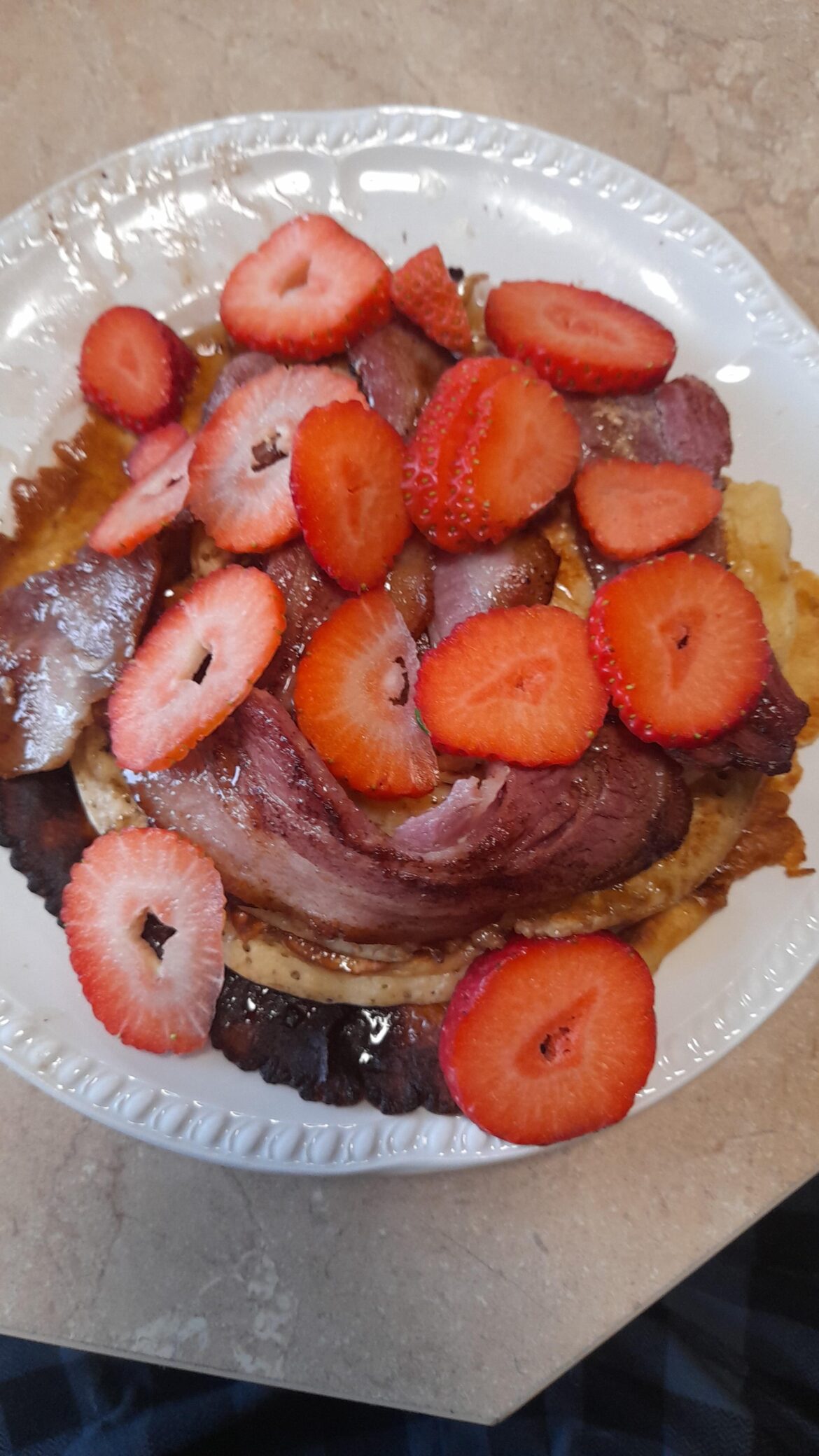 Pancakes, maple syrup, strawberries and bacon, can't beat it