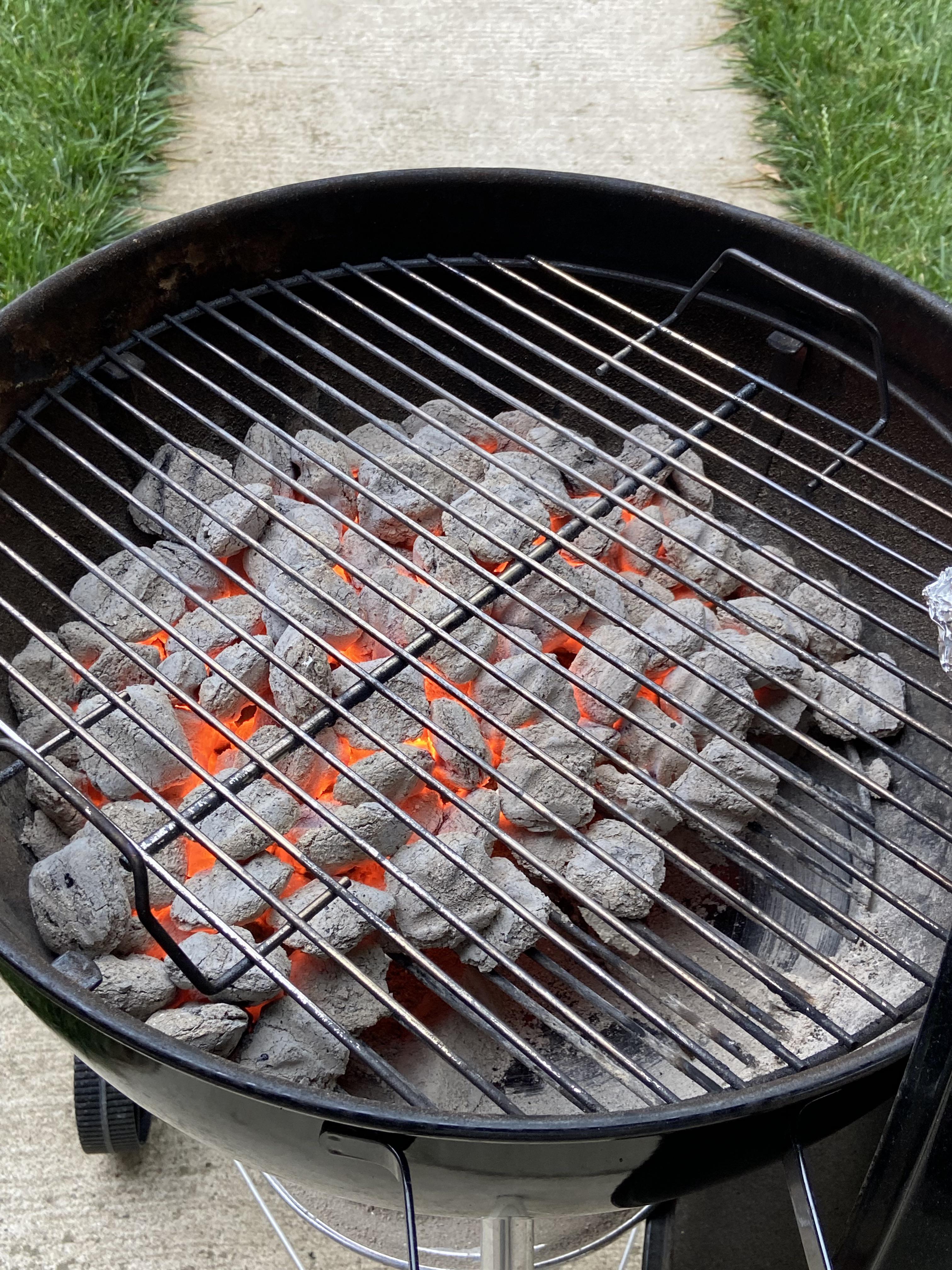 grilling with charcoal is superior because building the fire is half